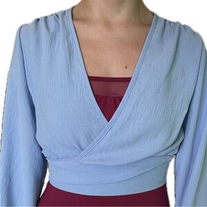 Donated to LA Fire victims. Papaya blue wrap top